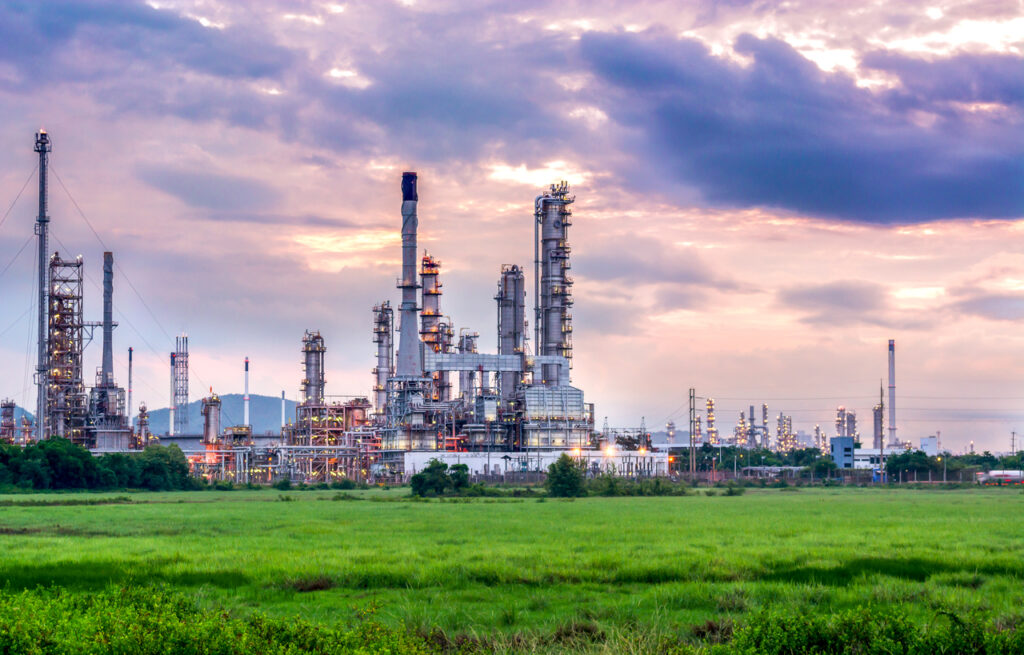 Oil and gas industry - refinery at sunset - factory - petrochemical plant