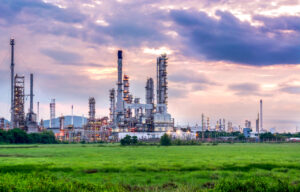 Oil and gas industry - refinery at sunset - factory - petrochemical plant