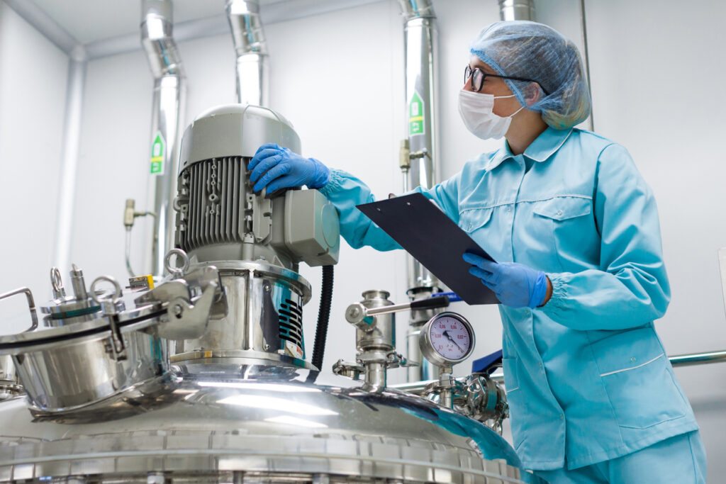 Scientist working in custom catalyst manufacturing lab.